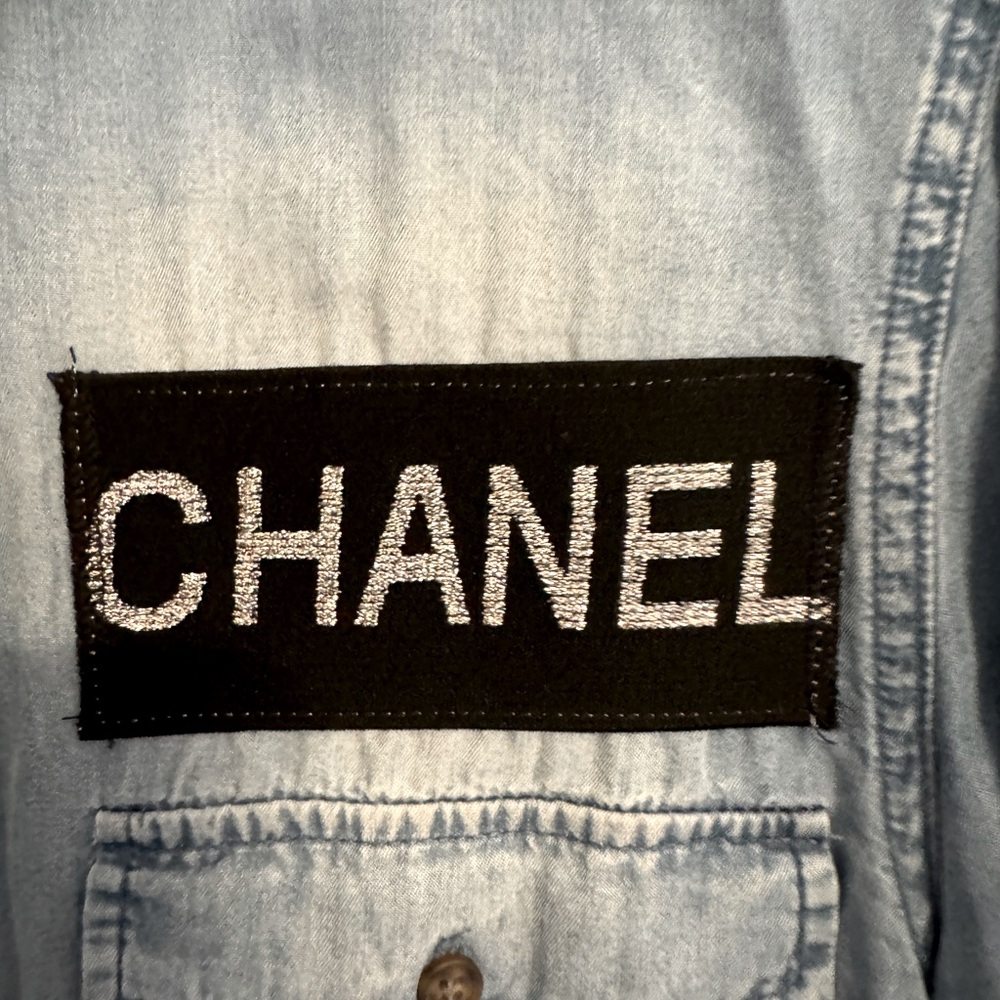 Light Blue Denim Button-Down with Black Logo Patch